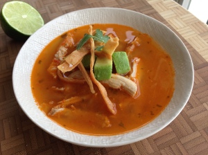 Simple ingredients result in a spectacular tortilla soup -- don't forget the avocados