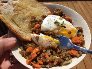 The runny yolk from a poached egg takes this French lentil dish to another level 